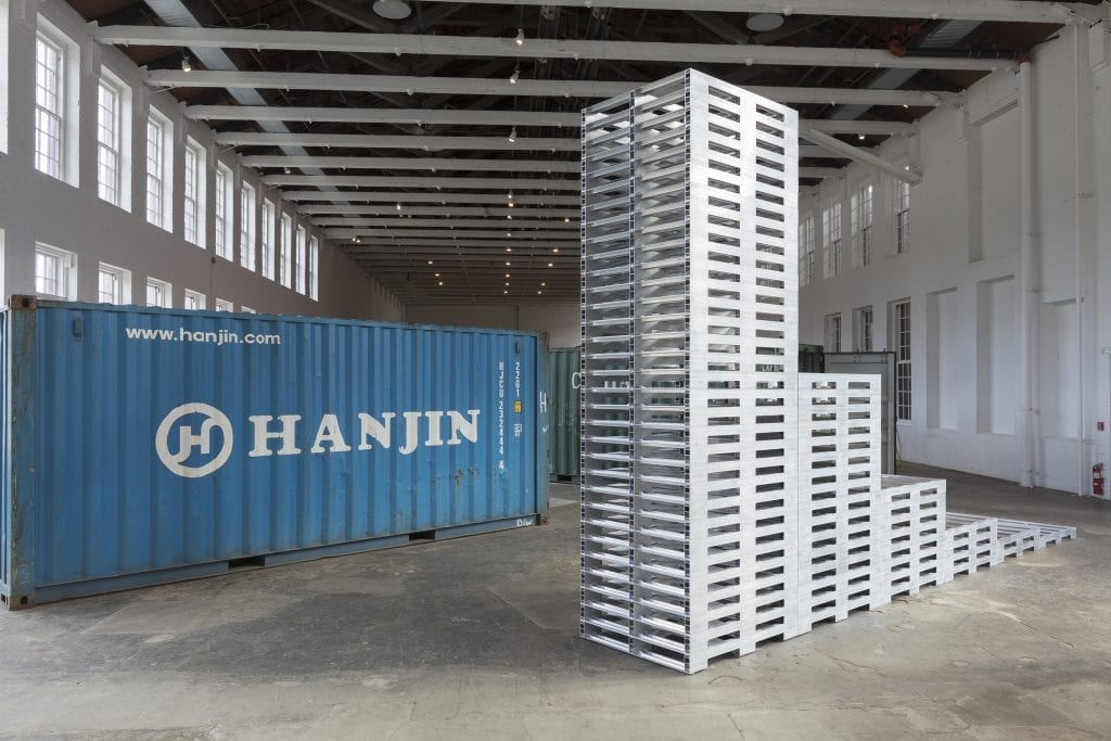 Moore's Law 2017, Exponential array of stainless steel forklift pallets in stacks of 1, 2, 4, 8, 16, and 32 Courtesy of the artist and Paula Cooper Gallery, New York, photo: Steven Probert