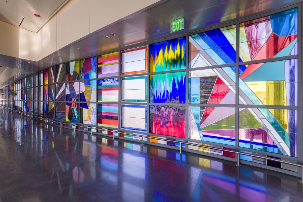 Sarah Cain Site-specific installation "We Will Walk Right Up To The Sun" [detail] at the San Francisco International Airport Grand Hyatt Hotel Air Train Station, San Francisco, CA 10 x 150 ft Installation view Courtesy of the artist and Vielmetter Los Angeles  Photo credit: Jeff McLane