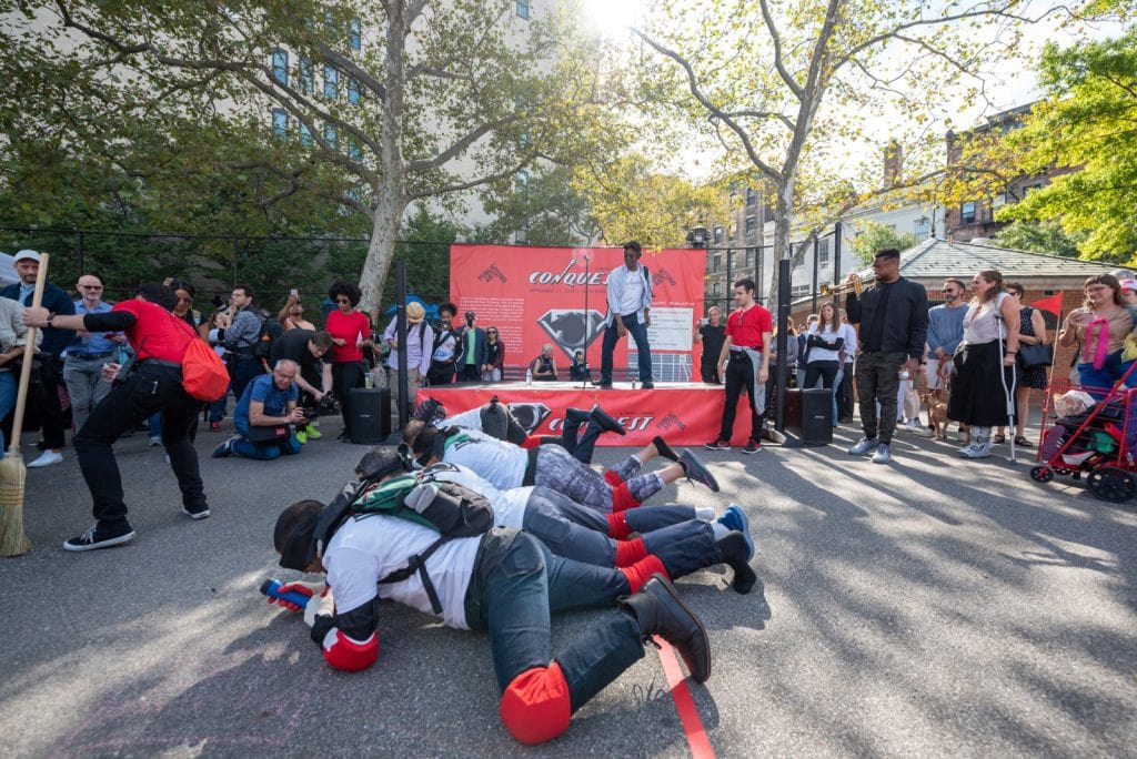 Pope.L, "Conquest," 2019. A group crawl featuring 140 participants, 5-hour duration. Commissioned by Public Art Fund and presented on September 21, 2019 in Downtown Manhattan, New York City © Pope.L Photo credit: Timothy Schenck, courtesy of the artist and Public Art Fund
