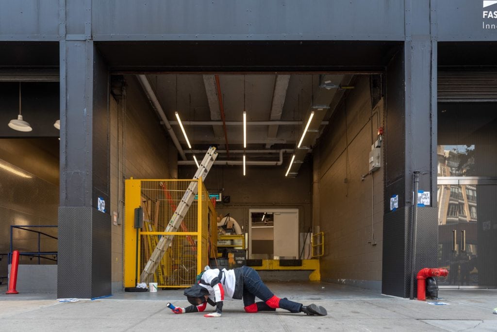 Pope.L, "Conquest," 2019. A group crawl featuring 140 participants, 5-hour duration. Commissioned by Public Art Fund and presented on September 21, 2019 in Downtown Manhattan, New York City © Pope.L Photo credit: Timothy Schenck, courtesy of the artist and Public Art Fund