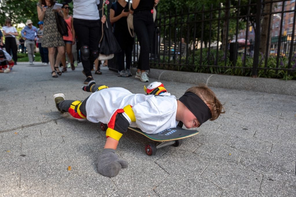 Pope.L, "Conquest," 2019. A group crawl featuring 140 participants, 5-hour duration. Commissioned by Public Art Fund and presented on September 21, 2019 in Downtown Manhattan, New York City © Pope.L Photo credit: Timothy Schenck, courtesy of the artist and Public Art Fund