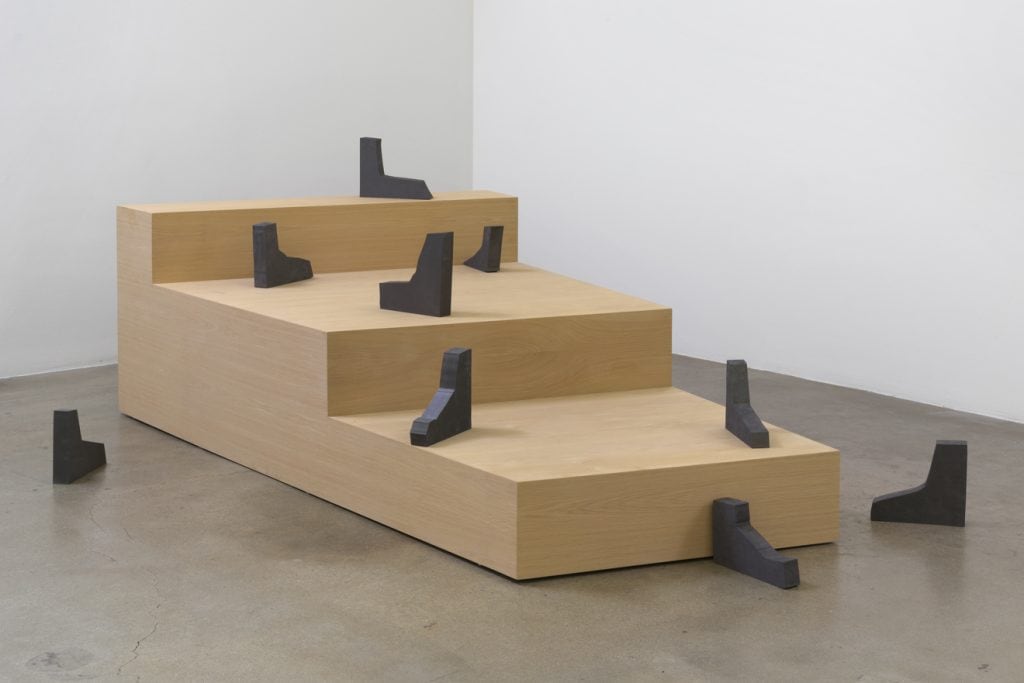 Shana Lutker, The Average Mysterious Interrupted , 2015, Wood, MDF, graphite, Stairs:  30" H x 58.25" W x 94.25" D, Boots approximately 12"H x 10"L x 2"D (9 boots), Photo cred: Robert Wedemeyer