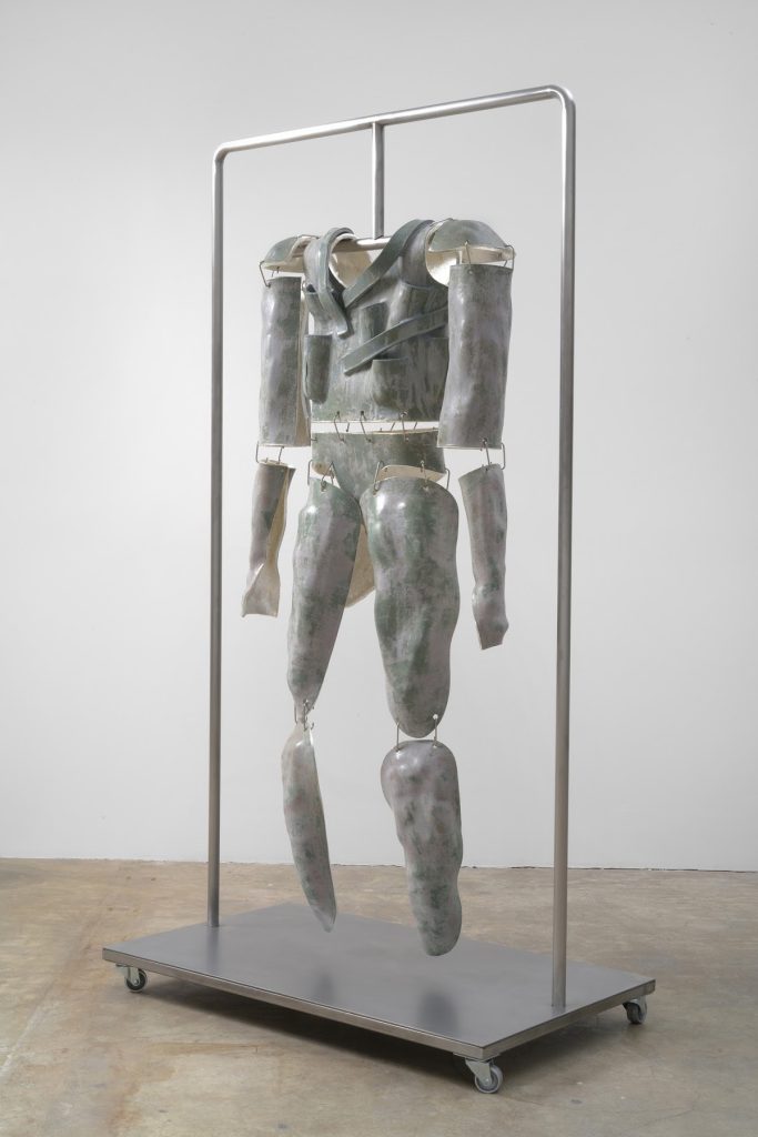 Liz Glynn “Affective Armor,” 2019 Glazed ceramic with silver leaf and stainless steel 59 x 28 x 9" [HxWxD] (149.86 x 71.12 x 22.86 cm) body armor; 75 x 61 x 24" [HxWxD] (190.5 x 154.94 x 60.96 cm) overall dimensions Inventory #GLY147 Courtesy of the artist and Vielmetter Los Angeles Photo credit: Robert Wedemeyer