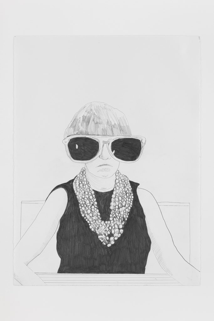 This image depicts an artwork by Whitney Bedford titled "Peggy Guggenheim (Glasses)." This artwork was created in 2021 and measures 30" x 22" [HxW] (76.2 x 55.88 cm). Its medium is Graphite on Arches Paper.
