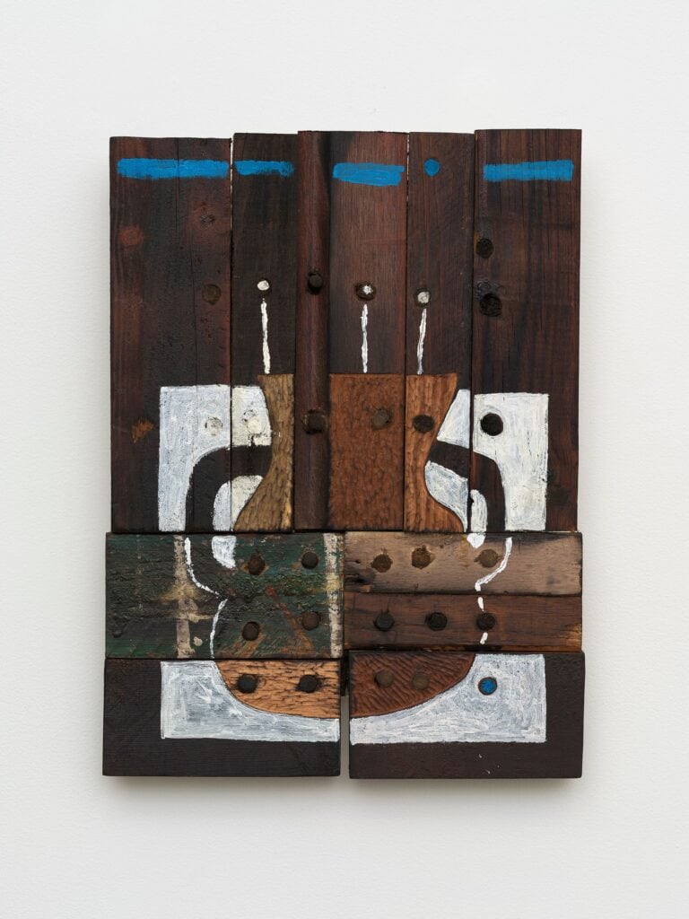 This image depicts an artwork by Roberto Diago titled "Untitled." This artwork was created in 2026 and measures 15 ³⁄₄" x 12" x 2 ³⁄₈" [HxWxD] (40.01 x 30.48 x 6.05 cm). Its medium is Mixed media on recovered wood.